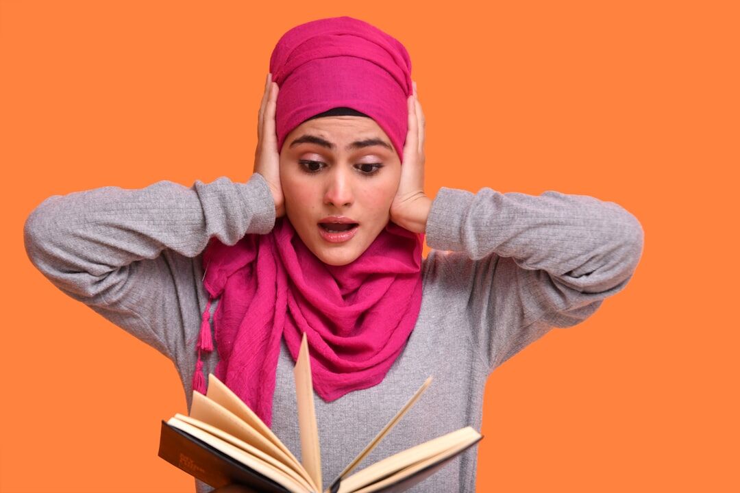 surprised reader with book